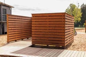 Modern horizontal cedar fence installed in a residential outdoor area